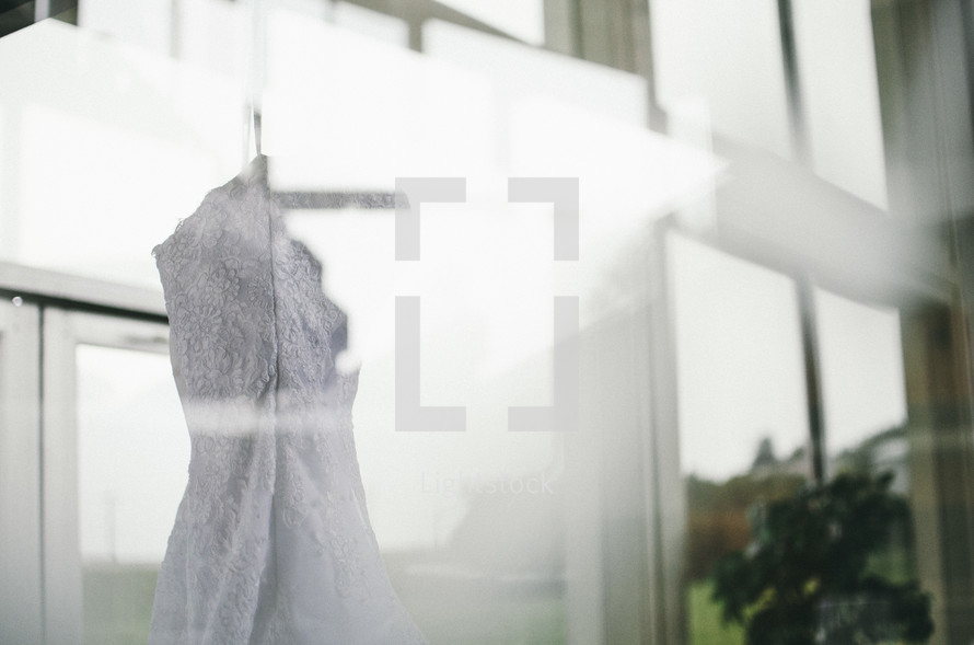 wedding dress in a window 