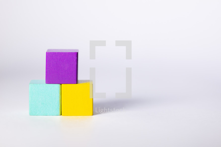 Colored wooden toy cubes