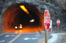 Stop sign by tunnel