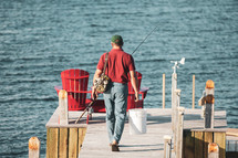 a man with a fishing pier on a dock 