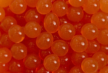 Small orange shiny beads