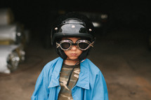 Boy wearing goggles and helmet