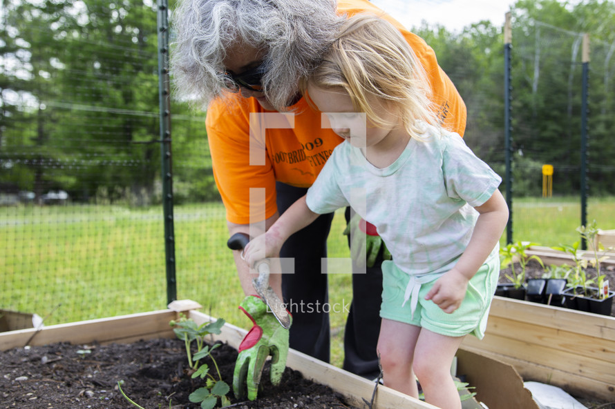 mother and daughter gardening 