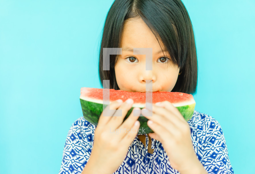 girl eating watermelon 