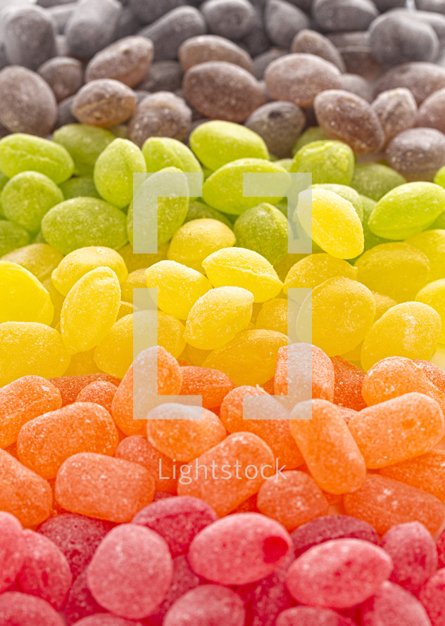 red, orange, brown, green Old Fashioned Hard Candies Isolated on a White Background
