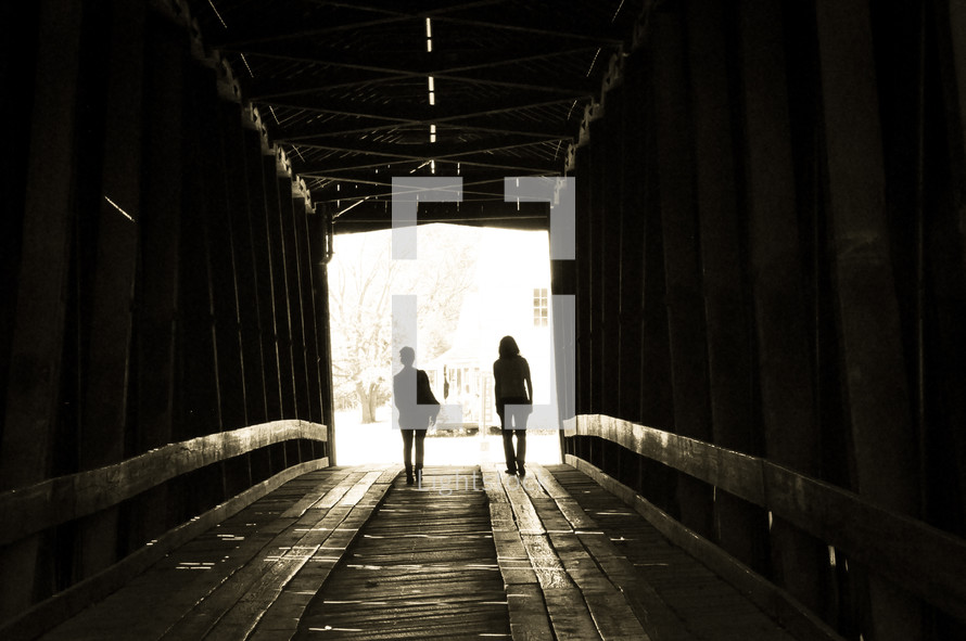 walking on a covered bridge 
