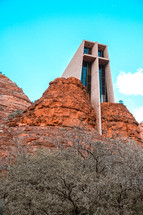 church building in red rock cliffs 