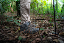 Close up shoe,Hikers standing in forest.