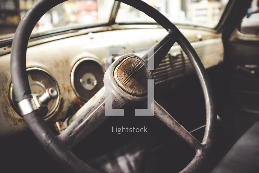 vintage steering wheel in a car 