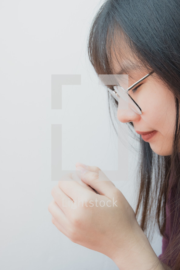 young woman praying 