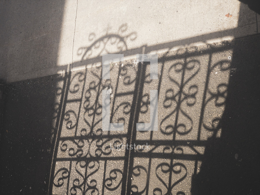 shadows from a railing 