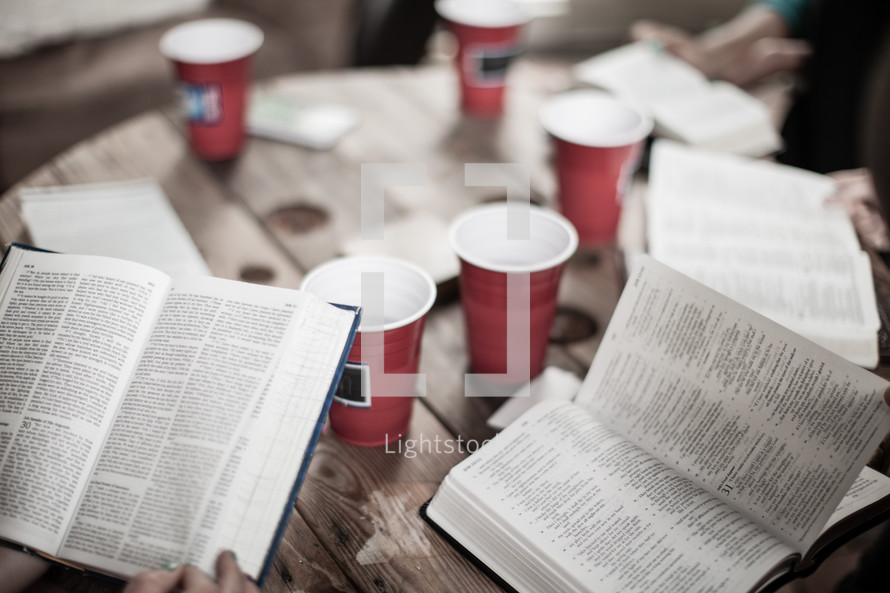 reading Bibles in a small group Bible study 