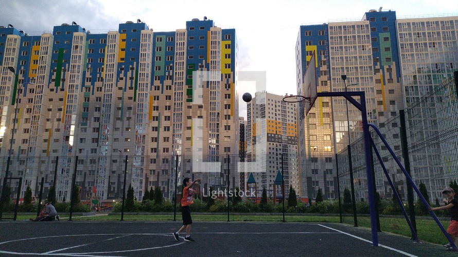 basketball court and apartment complexes 