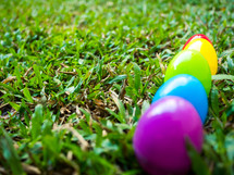 colorful easter eggs in grass 