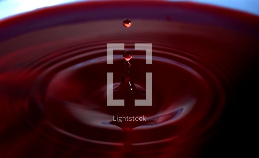Water drop photography, red water drops, splashes and spire