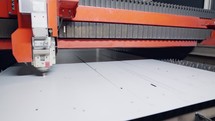 Laser cutting machine cutting a large metal sheet