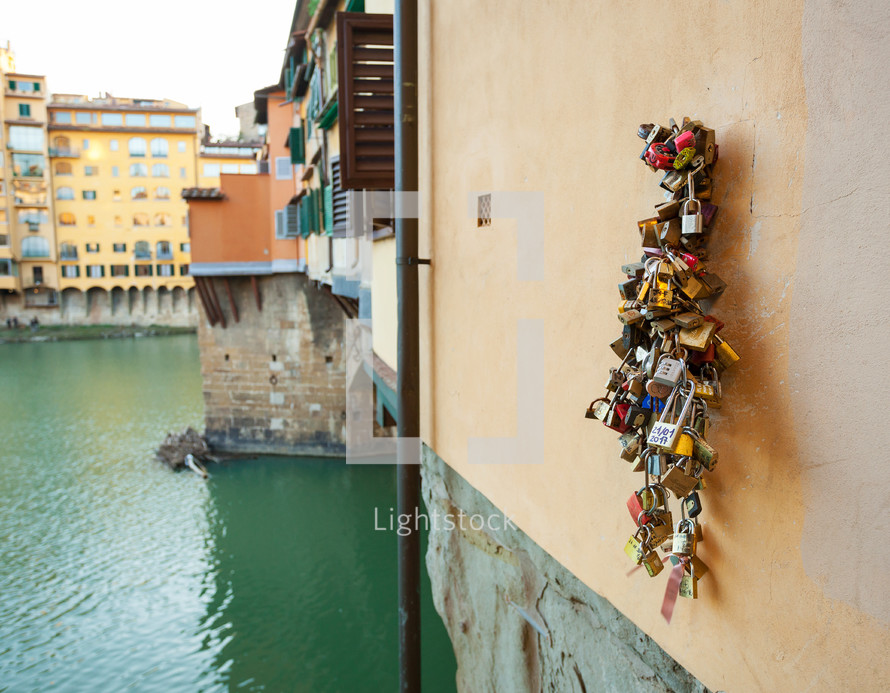 Cluster of padlocks on Ponte Vecchio Bridge, Florence, Italy.