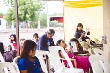 people at an outdoor worship service in Mexico 