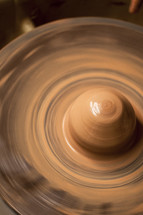 clay on a potter's wheel 