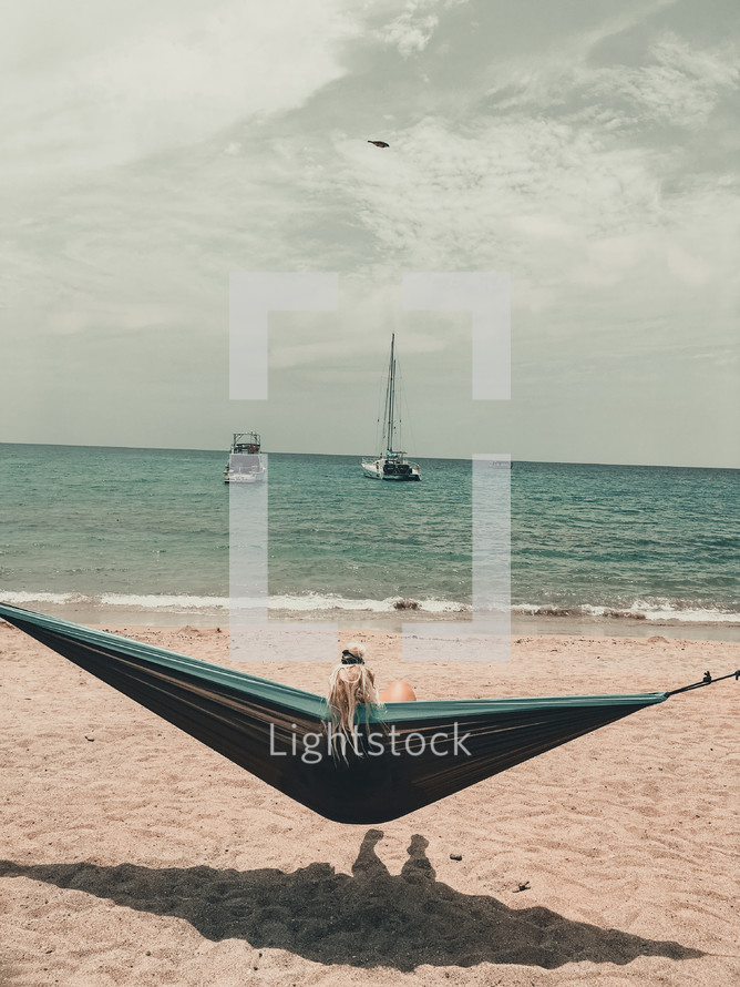 relaxing in a hammock on the beach 