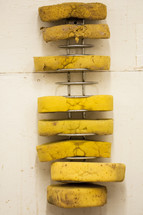 pottery artists sponges on a rack 