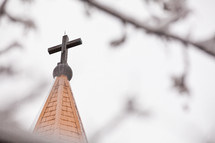 cross topper on a church steeple