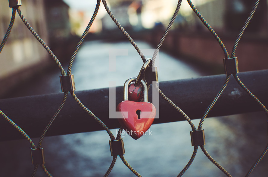heart lock on a fence 