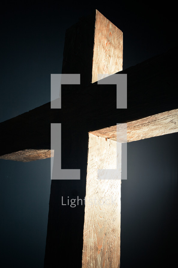 spotlight shining on a cross