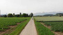 women cycling in rural switzerland