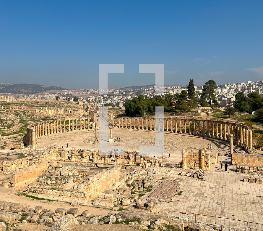 The Greco-Roman city of Gerasa and the modern Jerash in the background in Jerash, Jordan.