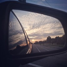 road view through a rearview mirror