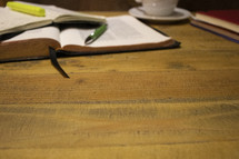 Bible and pen on a table 