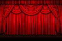 closed curtains on stage 