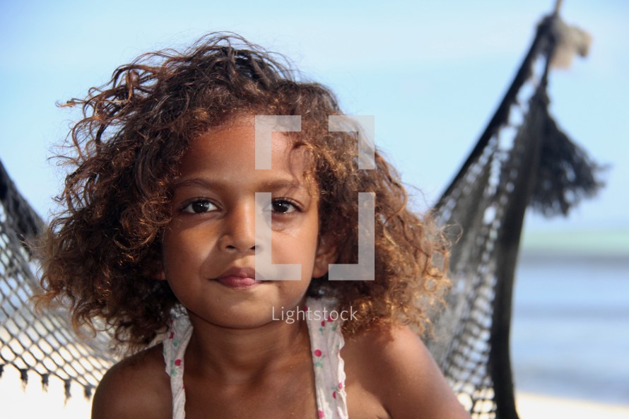 headshot of a young island girl 
