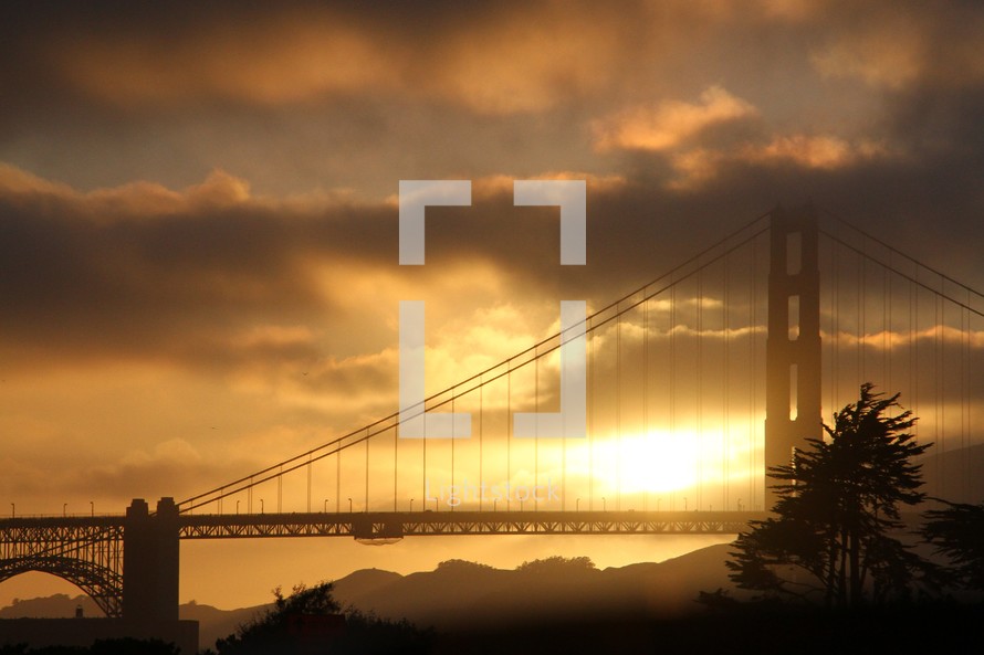 Sunset behind the Golden Gate Bridge.