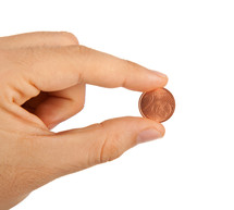 money - 2 euro cent between the fingers on white background
