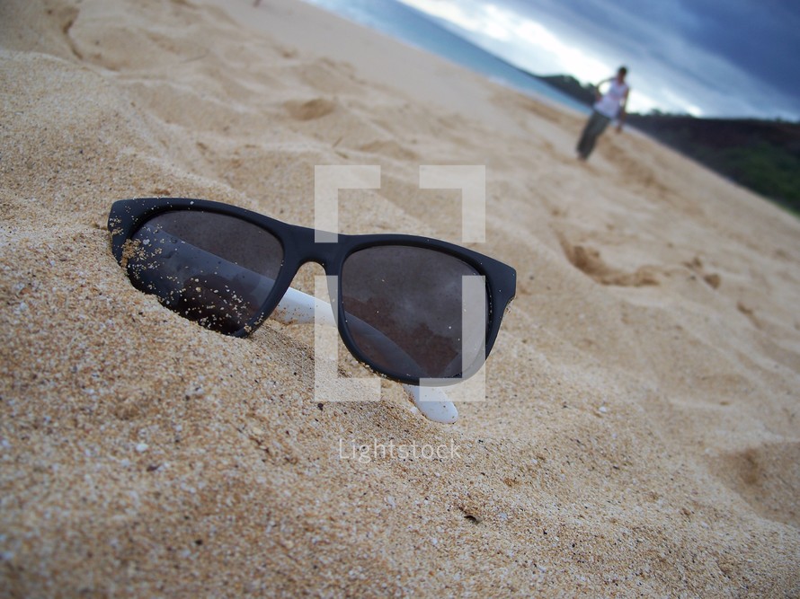 sunglasses in the sand
