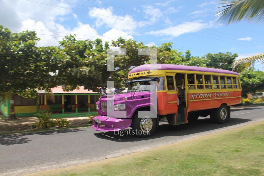 colorful tourbus on an island 