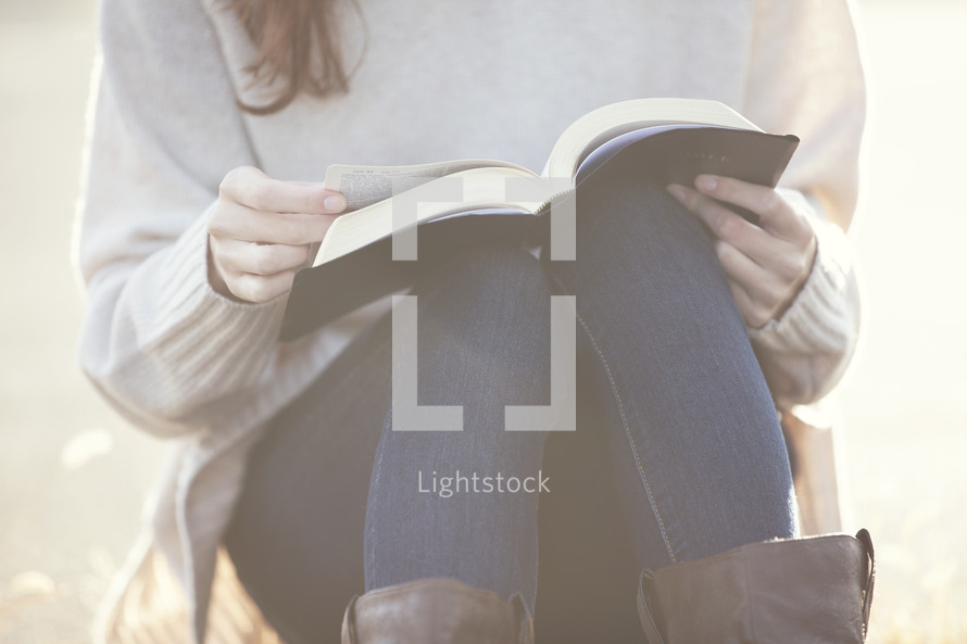 Girl reading a Bible 