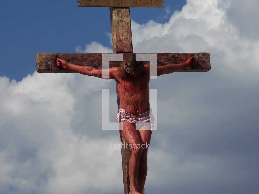 Jesus on the cross on Mount Calvary bleeding and dying for the sins of all mankind  - crucifixion 