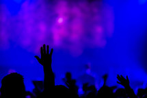 Worship service hands raised blue silhouette