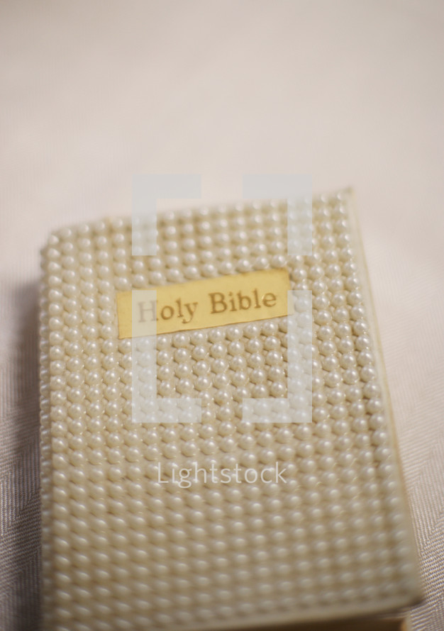 pearl studded Bible