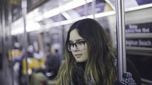 woman on a subway train 
