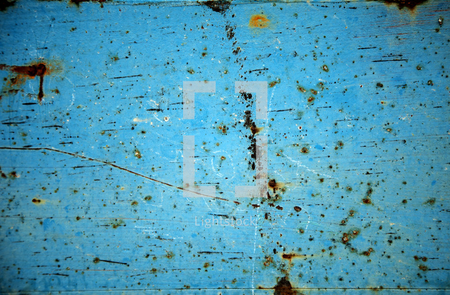 rusted sheet of blue metal 