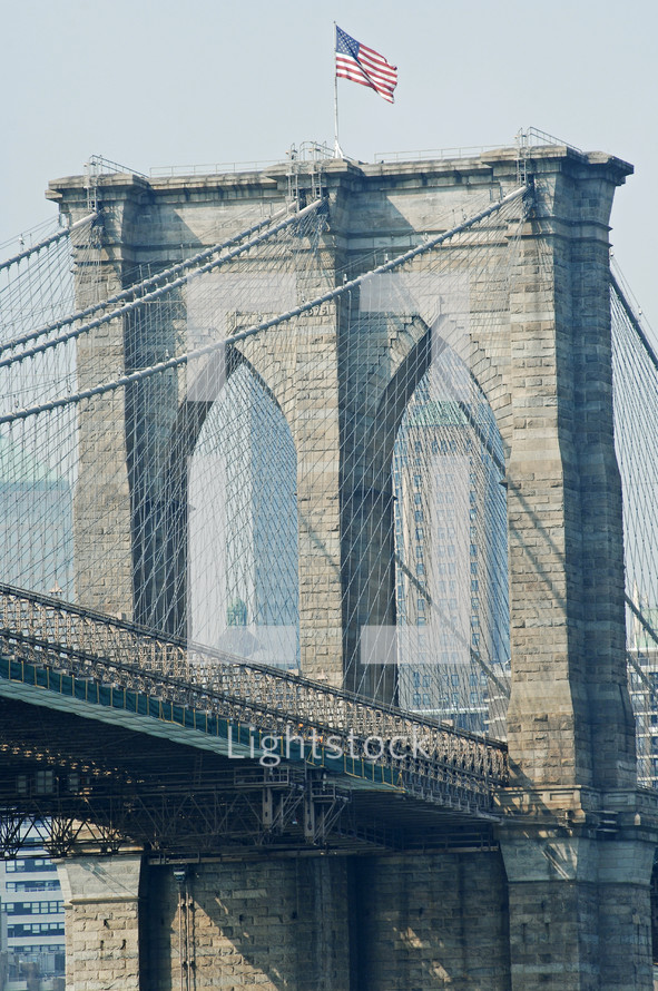 Brooklyn bridge and American flag 