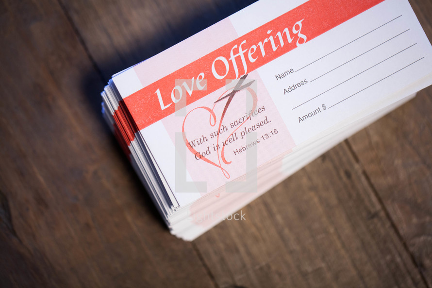Love offering envelopes stacked