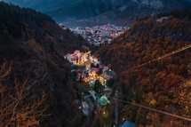Cable car and small town in the evening