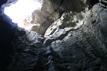 Looking up from a cave