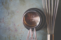 measuring cups and whisk 