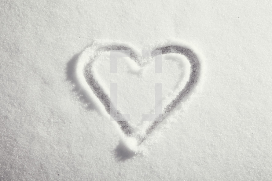 Heart drawn in the snow.